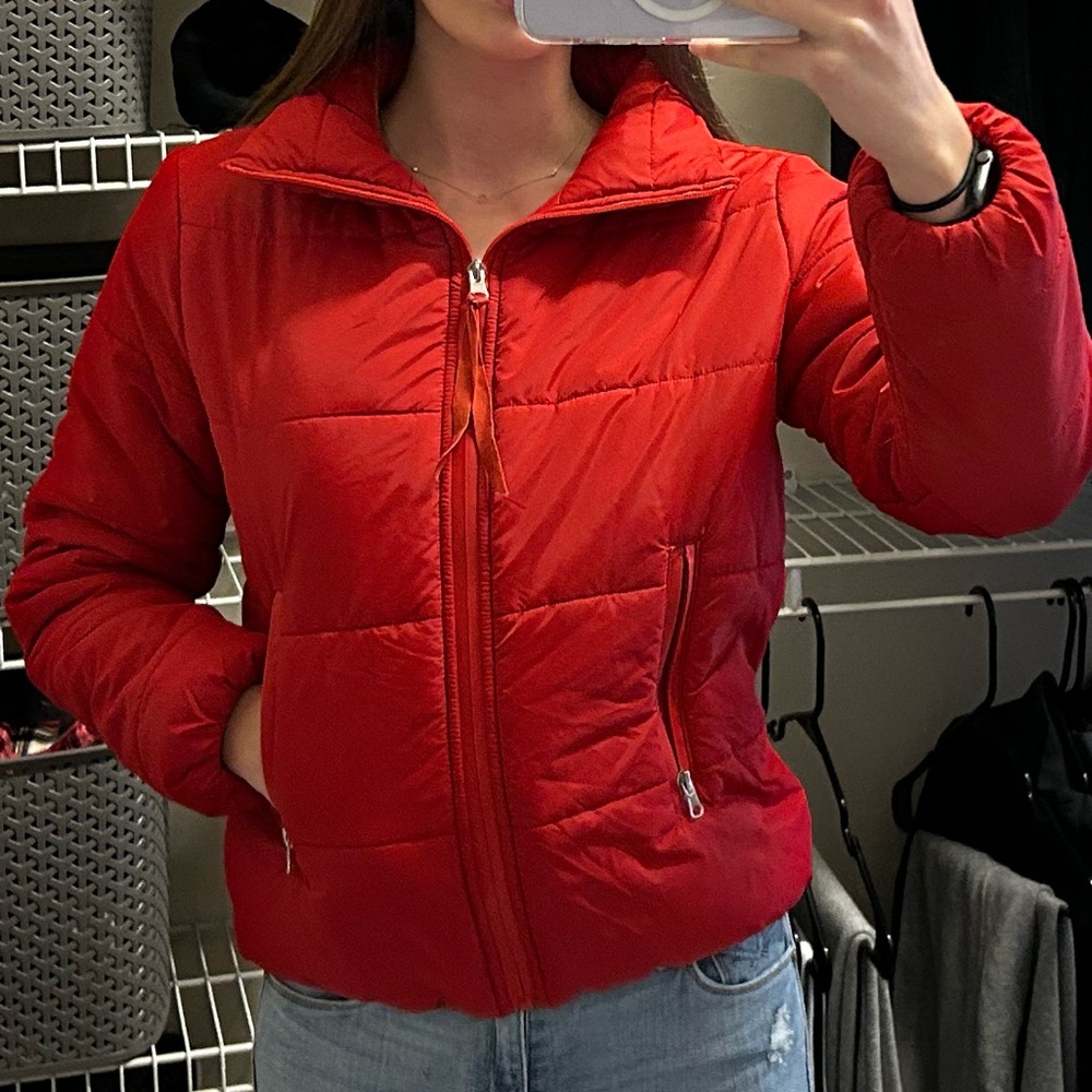 Red puffer coat